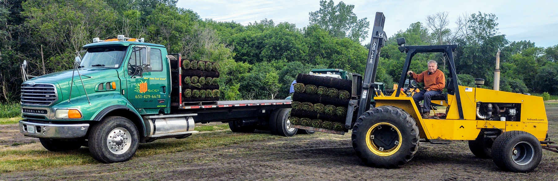 Hd Sod delivery truck with Harley on HD Sod's forklift